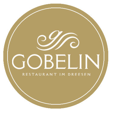 Kreisförmiges goldenes Logo mit GOBELIN und Restaurant im Dreesen in weißer Schrift und einem dekorativen Wirbel darüber.